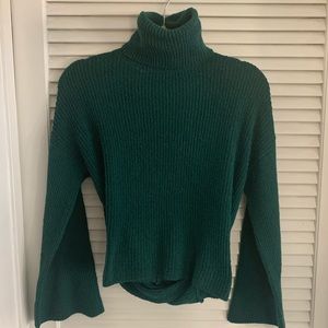 Forest green backless turtleneck.